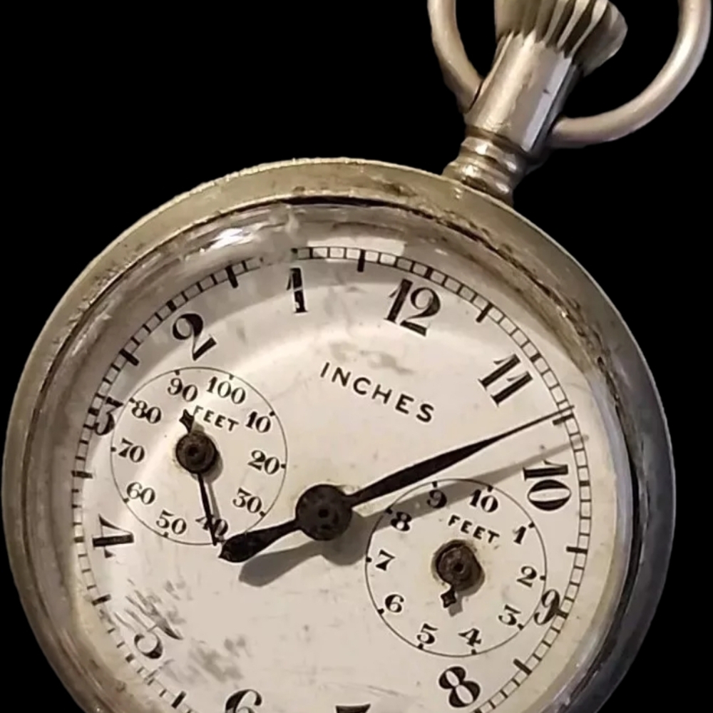 Vintage Silver Pocket Measuring Tape Made In Switzerland.